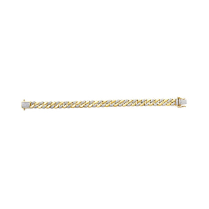Yellow metal bracelet with alternating links featuring white round gemstones in prong settings, shown in a top-down flat lay angle.