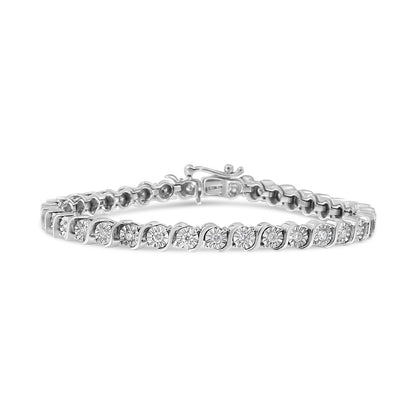White metal bracelet with round white gemstones in a wavy pattern, shown from a front angle.