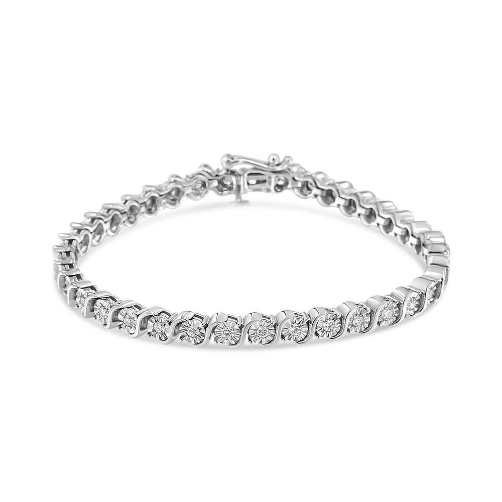 White metal bracelet with round white gemstones in a curved setting, shown from a slight top-front angle on a white background.