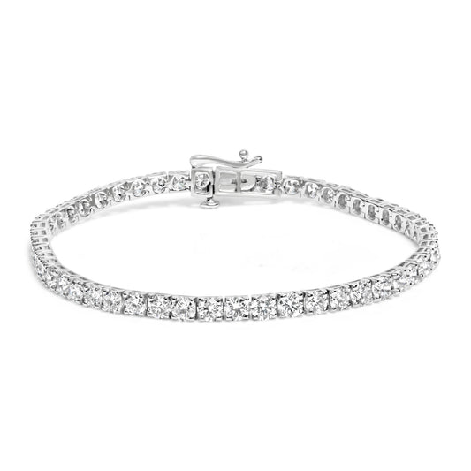 White metal tennis bracelet with round white gemstones in prong settings, shown in a front angled view.