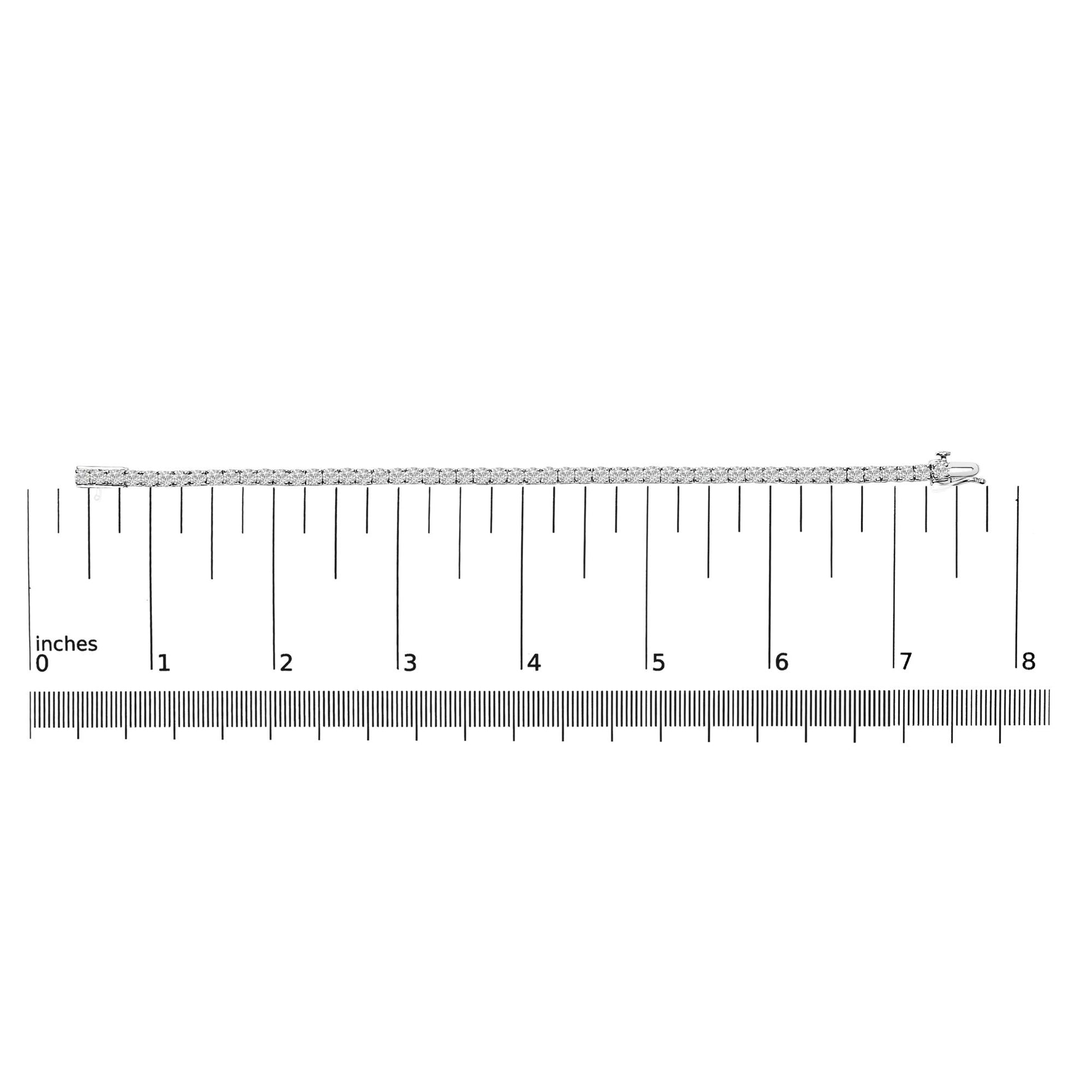 White bracelet with round white gemstones in prong settings, shown flat on a scale, photographed from a top-down angle.