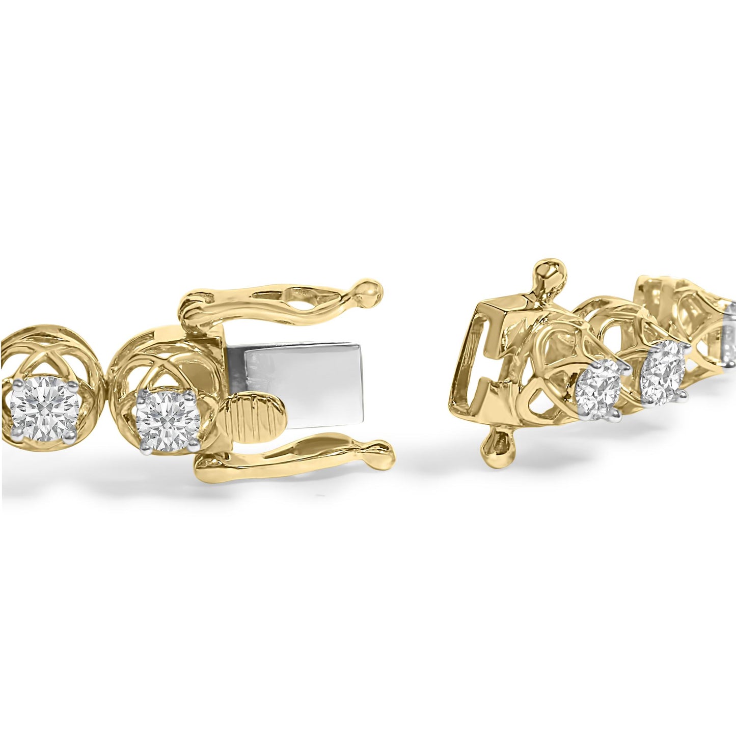Close-up front angle of a yellow metal bracelet with round white gemstones in prong settings, showing the clasp mechanism.