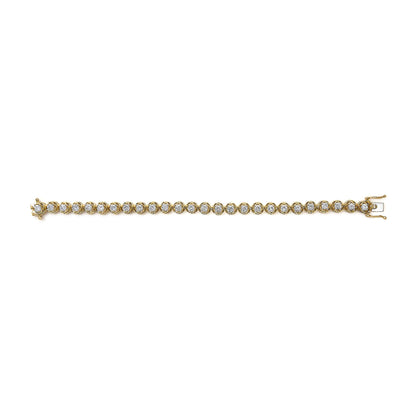 Yellow bracelet with round white gemstones in prong settings, shown flat from a top-down angle.
