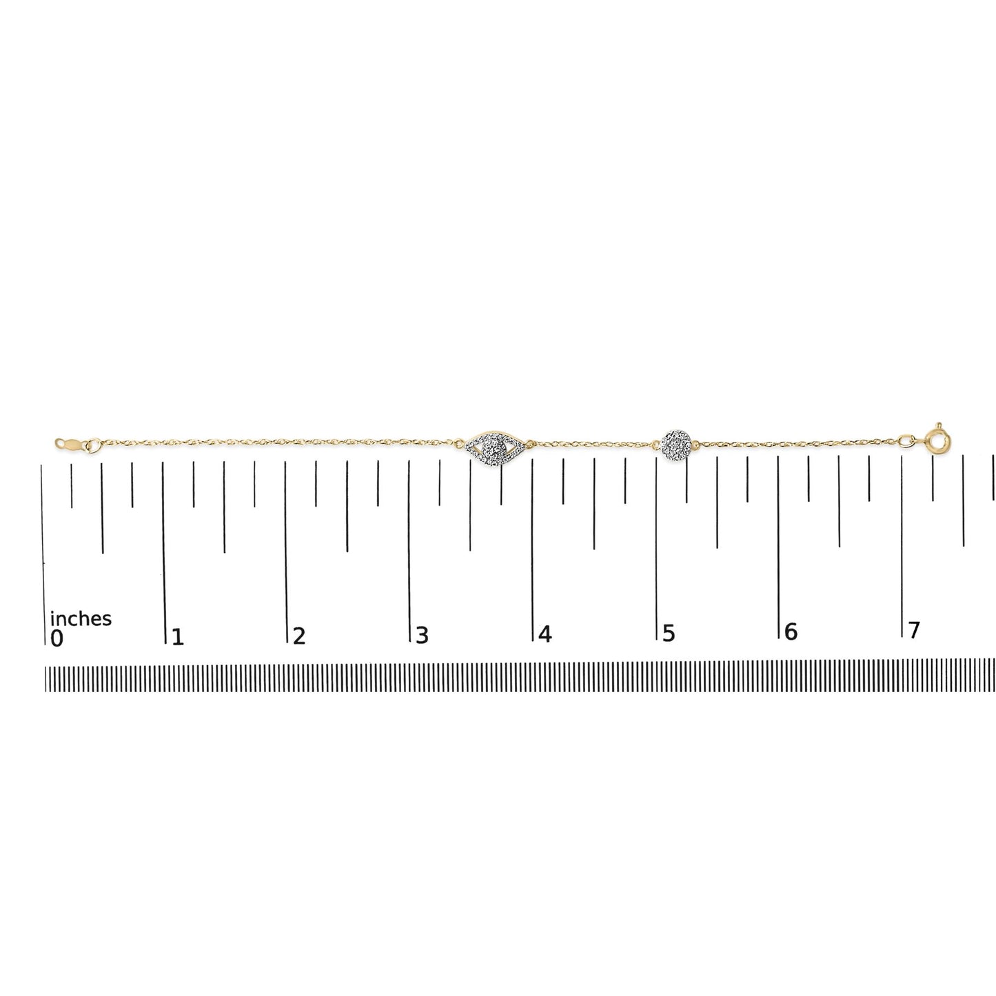 Yellow metal bracelet with two white gemstone clusters, one in an eye shape and one round, shown on a scale in a top-down elevation view.