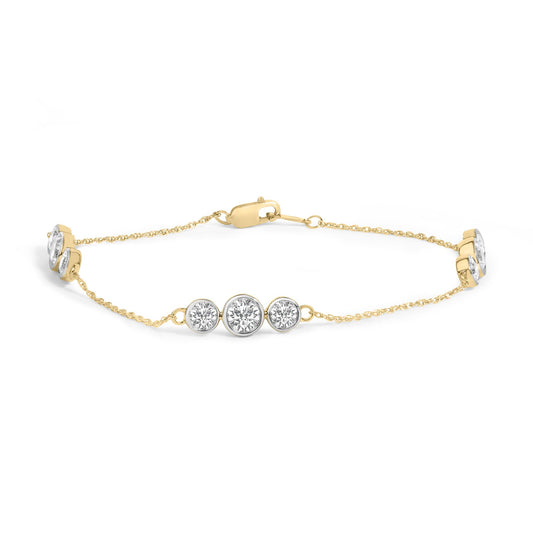 Front view of 14K Gold 1/2 Cttw Bezel Set Lab Grown Diamond Station Bracelet showcasing round diamond stations with a white background