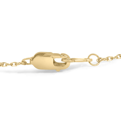 Close-up front view of a yellow metal bracelet clasp and chain links shown on a white background.