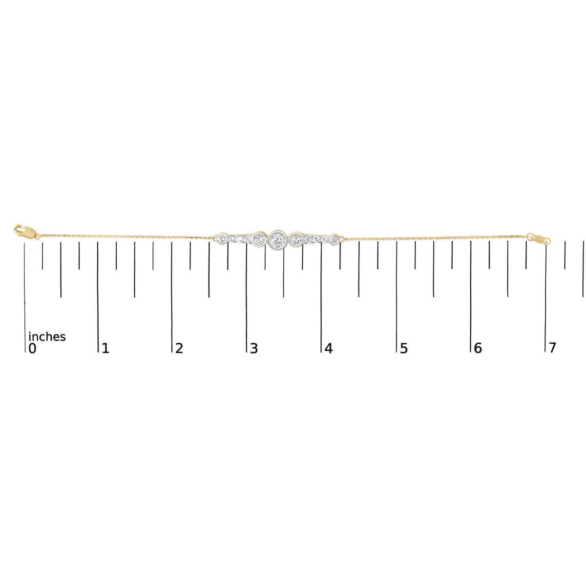 Yellow metal bracelet with five groupings of round white gemstones in prong settings, shown on a scale, front view.
