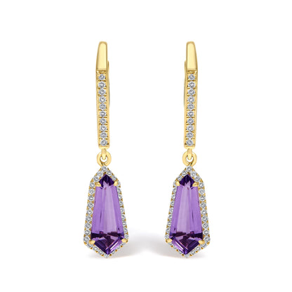 Close-up front view of a pair of yellow metal drop earrings featuring elongated triangular purple gemstones surrounded by small white gemstones, with a vertical row of small white gemstones on the upper part.