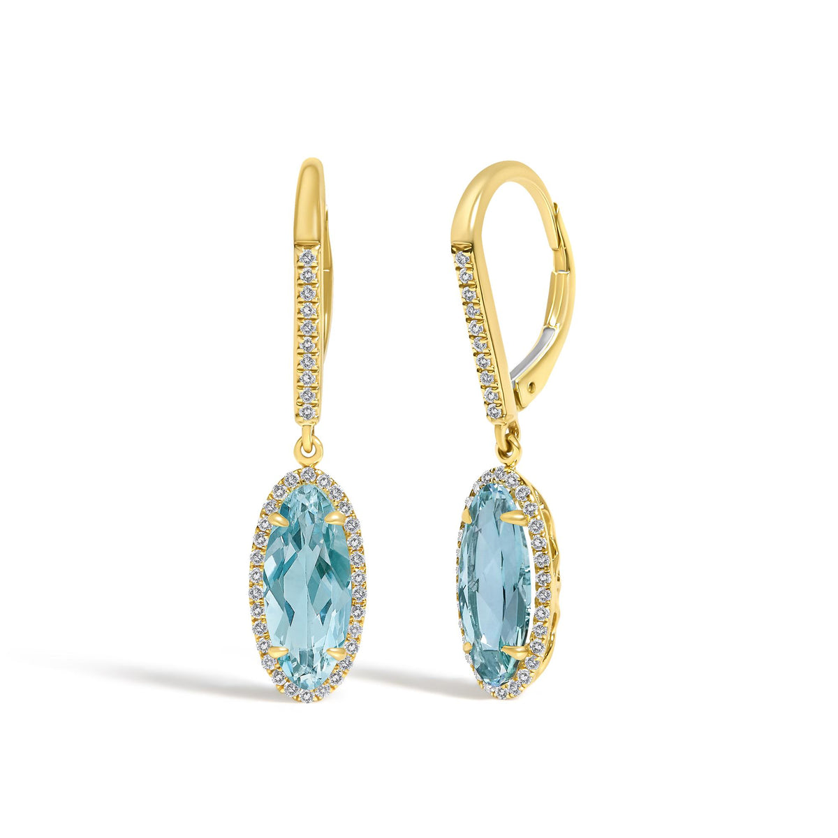 Close-up front view of yellow metal earrings featuring oval blue gemstones surrounded by a border of small white gemstones and accented with a line of small white gemstones along the upper part.
