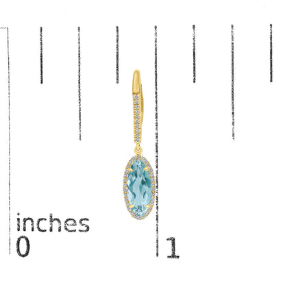 Close-up of single yellow earring shown on a measurement scale. The earring features an oval blue gemstone with a surrounding halo of small white gemstones and a yellow vertical bar with small white gemstones set in a row.