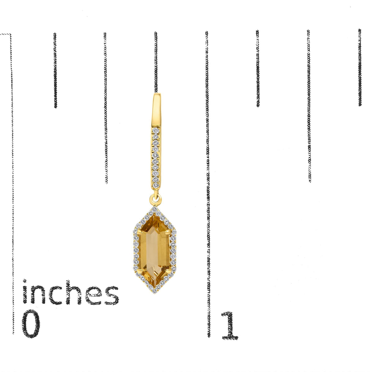 Close-up image of a yellow metal earring with round white gemstones in a micro-pave setting along the drop and a large yellow gemstone in a prong setting at the bottom, shown on a scale.