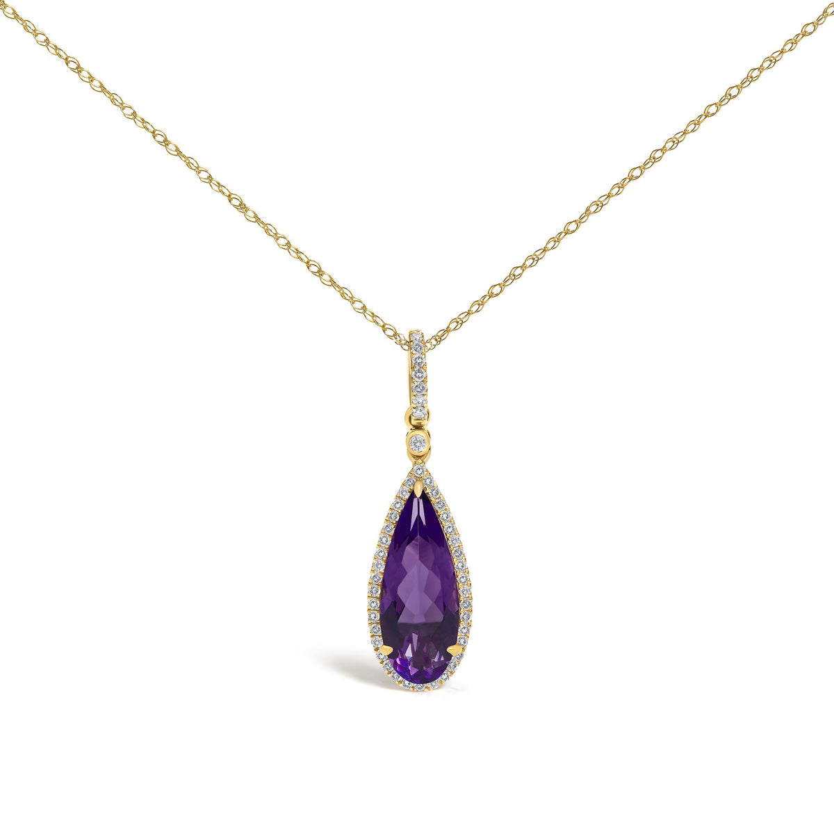 Close-up front view of a yellow metal necklace with a pear-shaped purple gemstone pendant surrounded by small white gemstones in a micro-pave setting.
