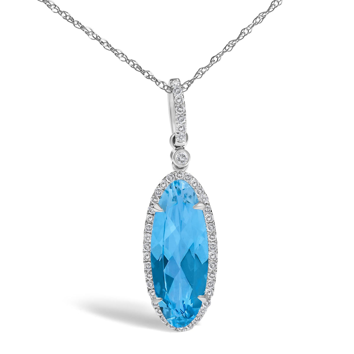 Close-up front view of a white metal necklace with a pendant featuring a large oval blue gemstone surrounded by small round white gemstones in a micro-pave setting. The pendant also has additional small round white gemstones above the blue gemstone.