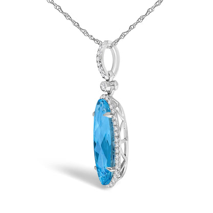 Close-up side view of white necklace with oval blue gemstone surrounded by small white gemstones, shown on a white background.