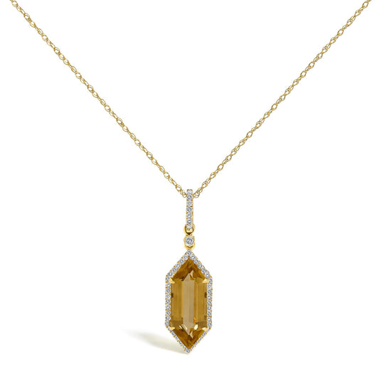 Close-up front view of a yellow metal necklace with a pendant featuring a large yellow gemstone surrounded by small white gemstones in a micro-pave setting. The pendant is shown on a white background.