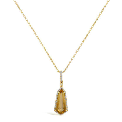 Close-up front view of a yellow metal necklace with a chain and a pendant featuring a large yellow gemstone surrounded by small white gemstones.
