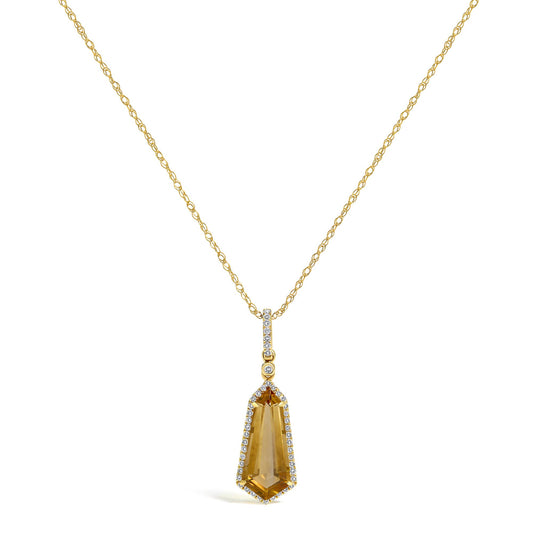Close-up front view of a yellow metal necklace with a chain and a pendant featuring a large yellow gemstone surrounded by small white gemstones.