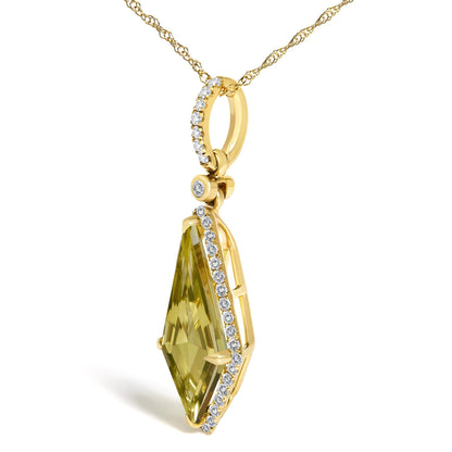 Close-up front angle of a yellow metal necklace pendant with a large lemon-colored faceted gemstone in a prong setting, bordered by white round gemstones in a micro-pave setting. The pendant hangs from a yellow metal chain.