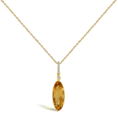 Yellow metal necklace shown front-facing on a white background with a vertical drop pendant featuring oval yellow gemstone at the bottom and small round white gemstones in a micro-pave setting above it.