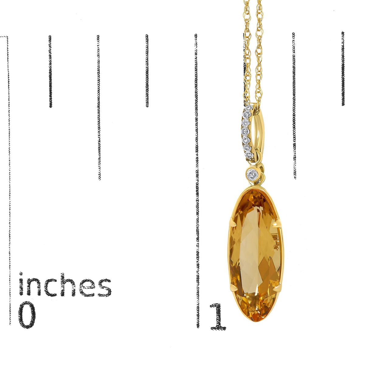 Close-up image of a yellow necklace pendant featuring an elongated oval yellow gemstone in a prong setting, accented by white round gemstones in a micro-pave setting above it, shown hanging on a chain against a background with measurement markings.