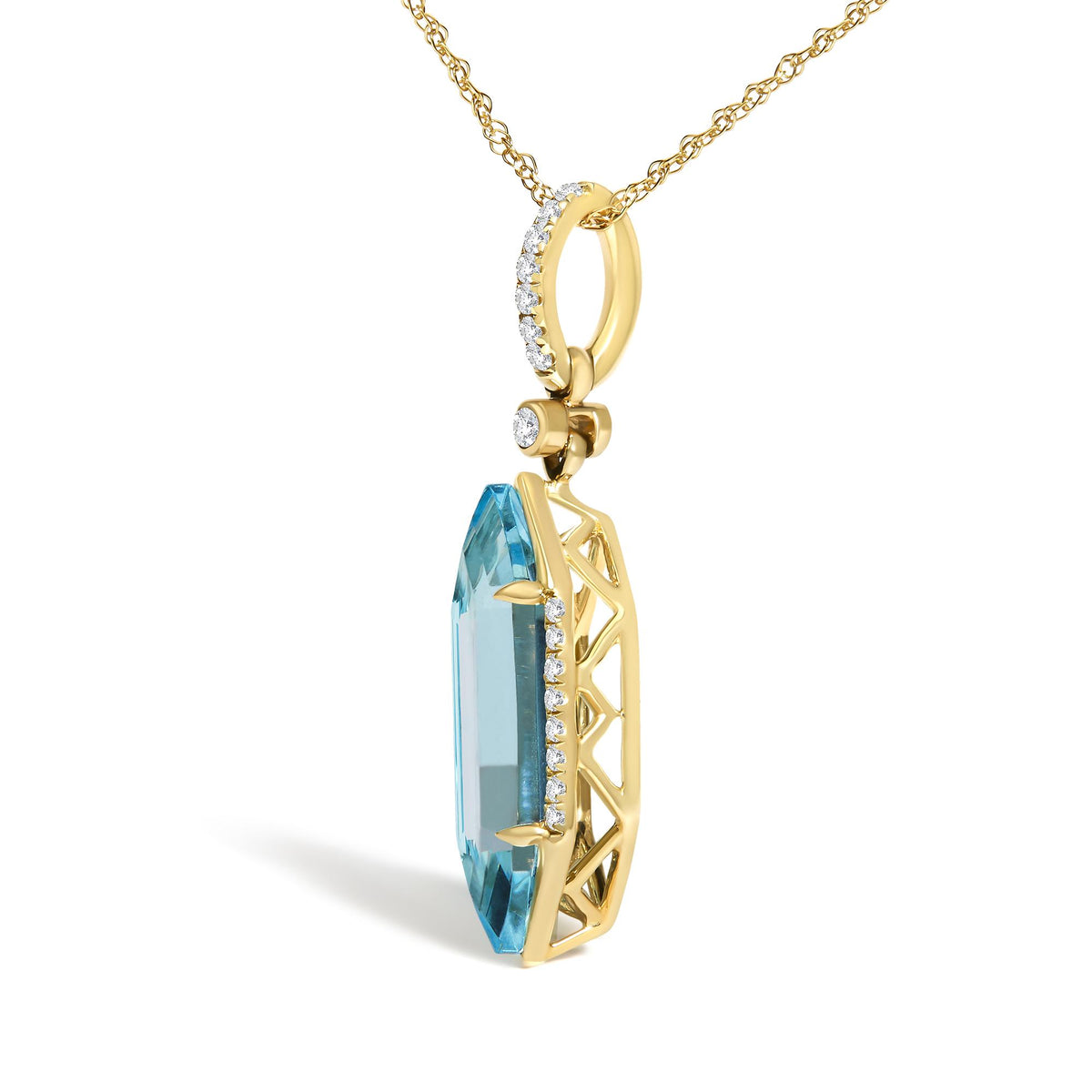 Close-up angle of a yellow metal necklace pendant featuring a large blue gemstone in a prong setting, accented with small white gemstones in a micro-pave setting along one side of the pendant's frame.