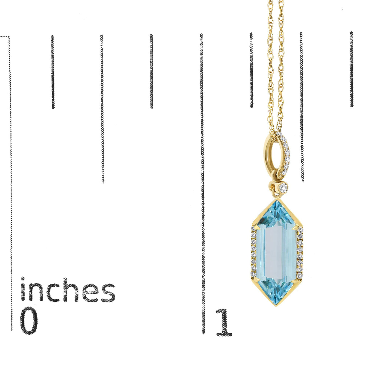 Close-up image of a yellow metal necklace pendant shown on a scale, featuring a geometric blue gemstone with a prong setting, surrounded by small white gemstones in a micro-pave setting along the edges and on a circular loop above it, photographed from a front angle.