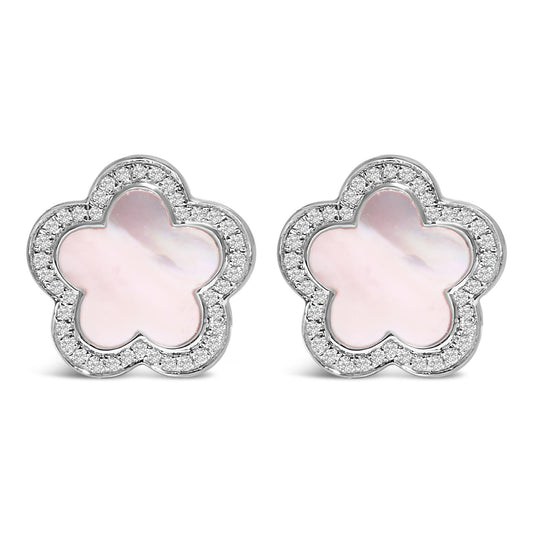 Front view of a pair of white metal flower-shaped stud earrings with central white mother of pearl gemstones in bezel settings, surrounded by micro-pave set round white gemstones.