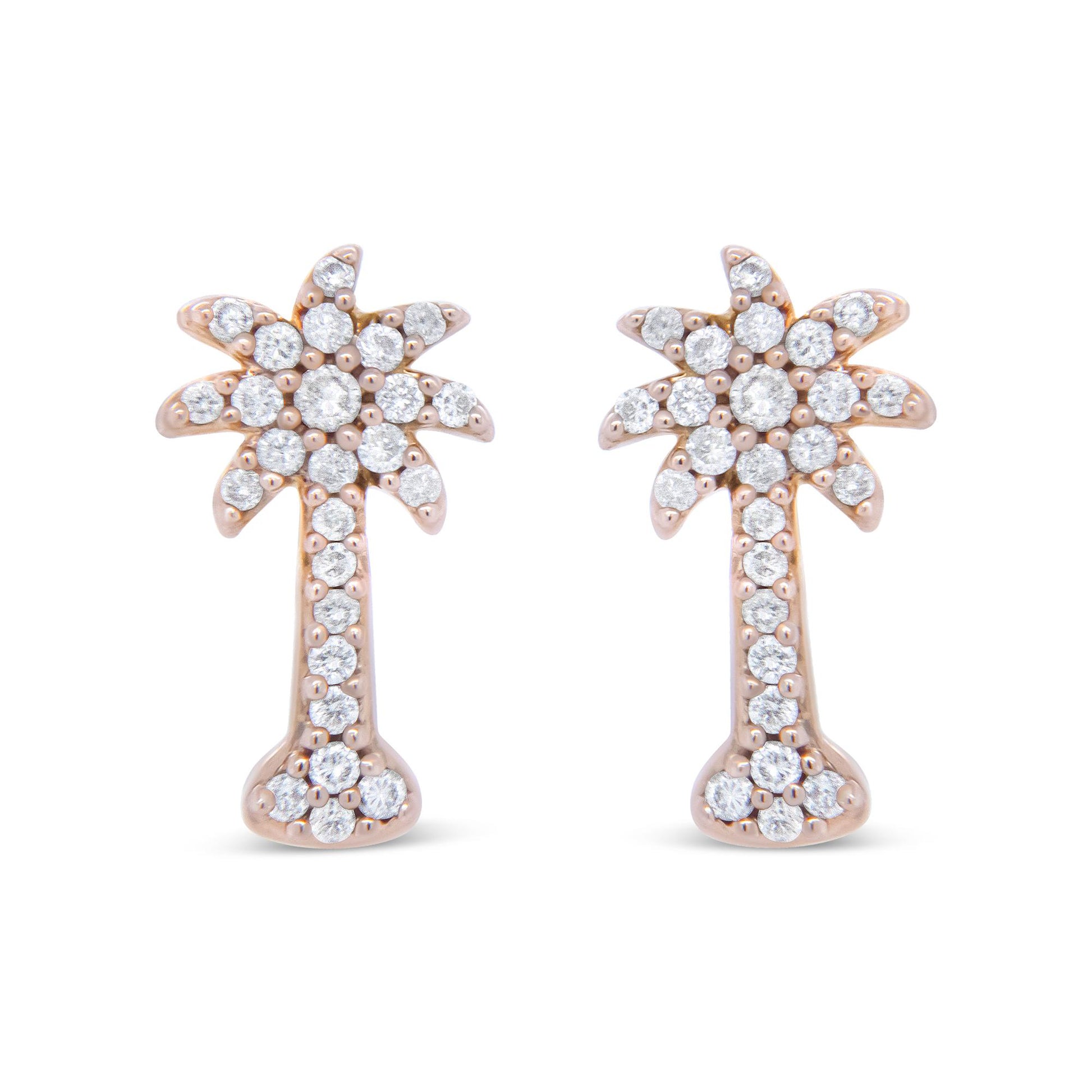 Front view of rose metal earrings shaped like stylized palm trees, adorned with round white gemstones in prong settings.