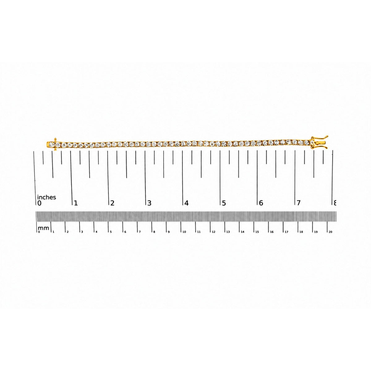 Yellow bracelet with round white gemstones in 4-prong settings shown flat on a scale, top-down view.
