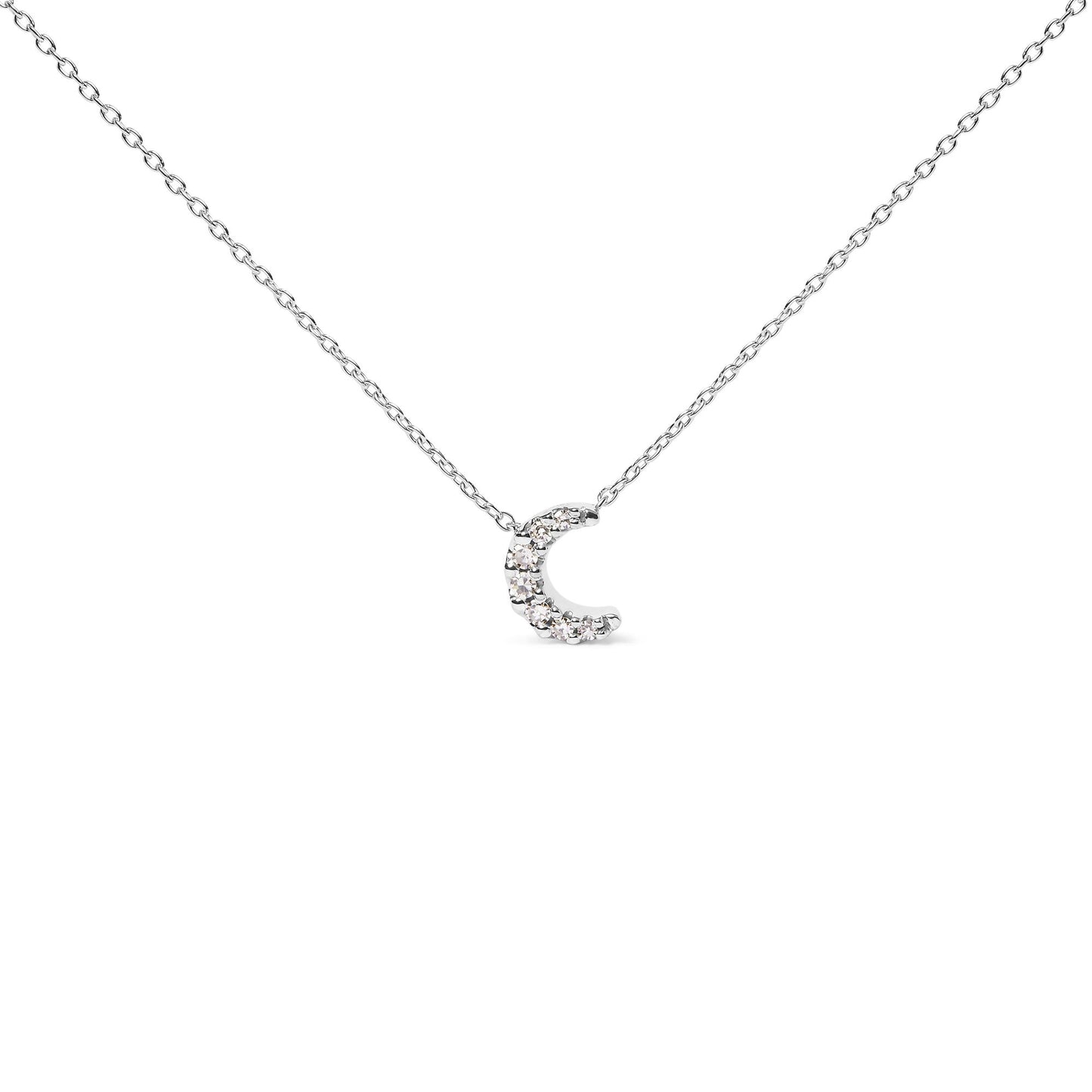 White metal necklace with a crescent-shaped pendant featuring round white gemstones in pave setting, shown in a front-facing angle.