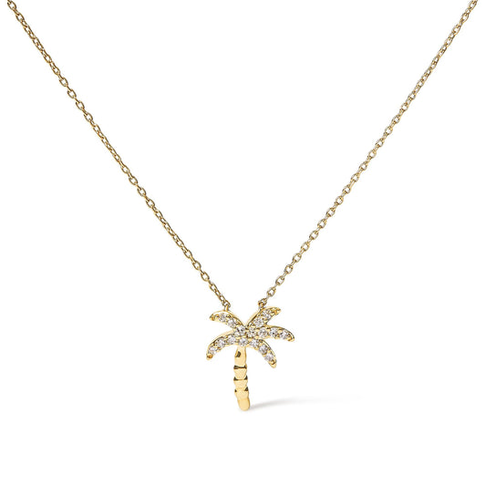 Front view of a yellow metal necklace with a palm tree-shaped pendant adorned with white round pave-set gemstones.