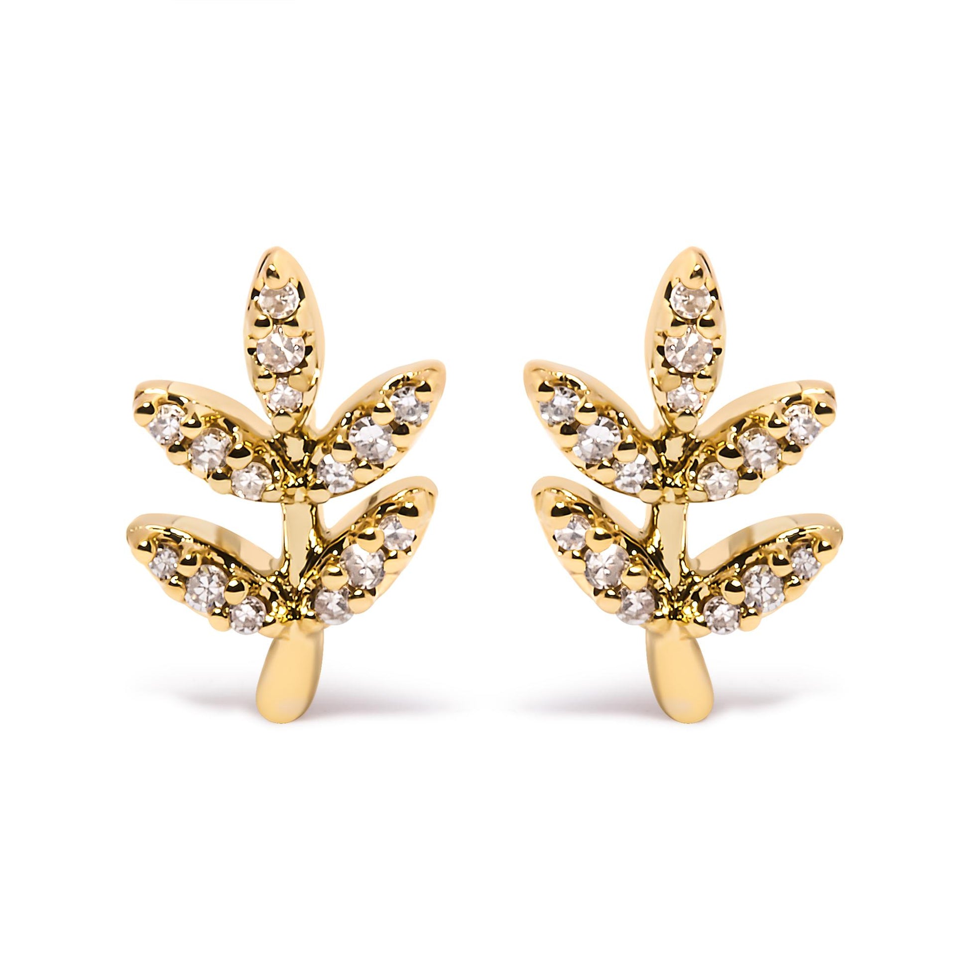 Front angle view of a pair of yellow metal earrings shaped like branches with leaves, each leaf adorned with round white gemstones in pave setting.