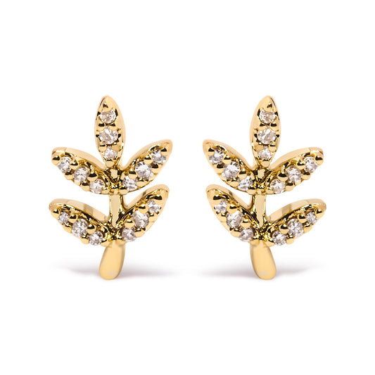 Front angle view of a pair of yellow metal earrings shaped like branches with leaves, each leaf adorned with round white gemstones in pave setting.