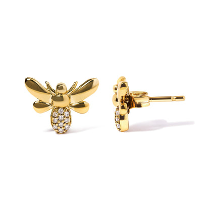 Front and side view of yellow metal bee-shaped earrings with white round gemstones in pave setting on the body, isolated on white background.