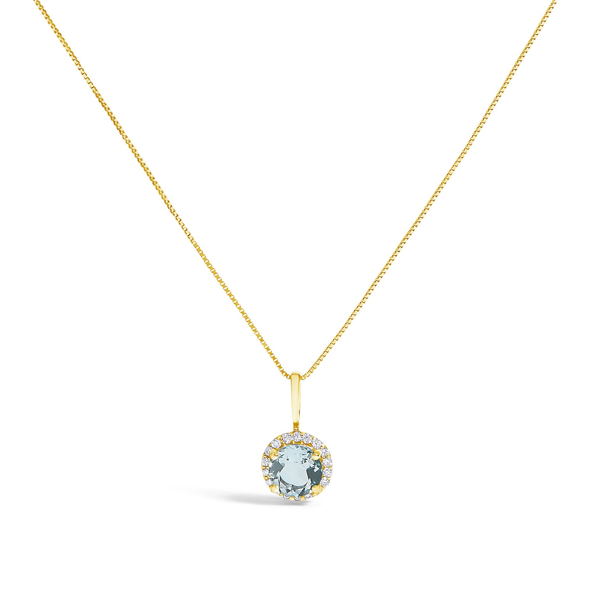 Yellow metal necklace with a round blue gemstone pendant surrounded by smaller white gemstones, shown in a front-facing view on a white background.