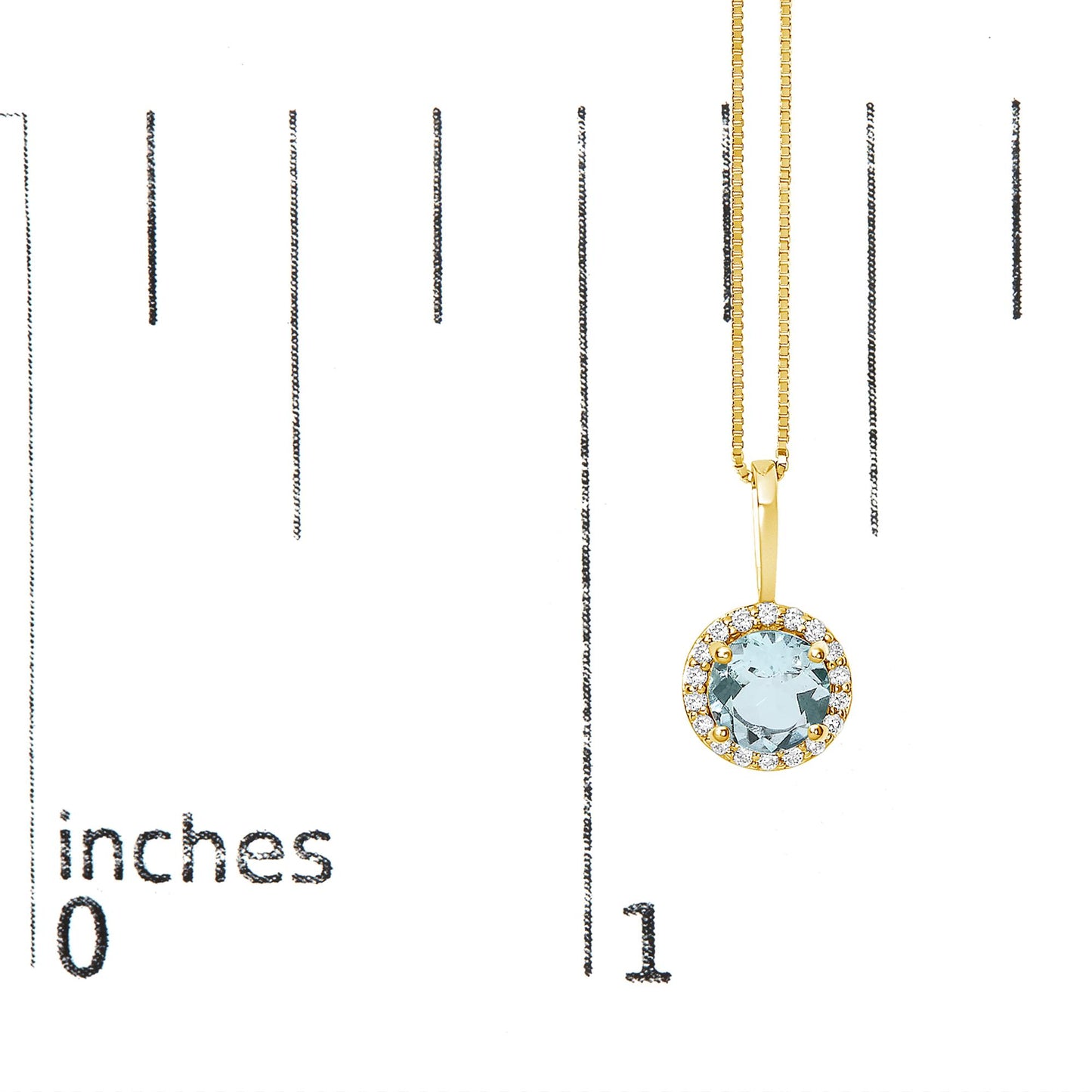 Yellow metal necklace with a round blue gemstone pendant surrounded by small white gemstones, shown hanging on a scale at a slight angle.
