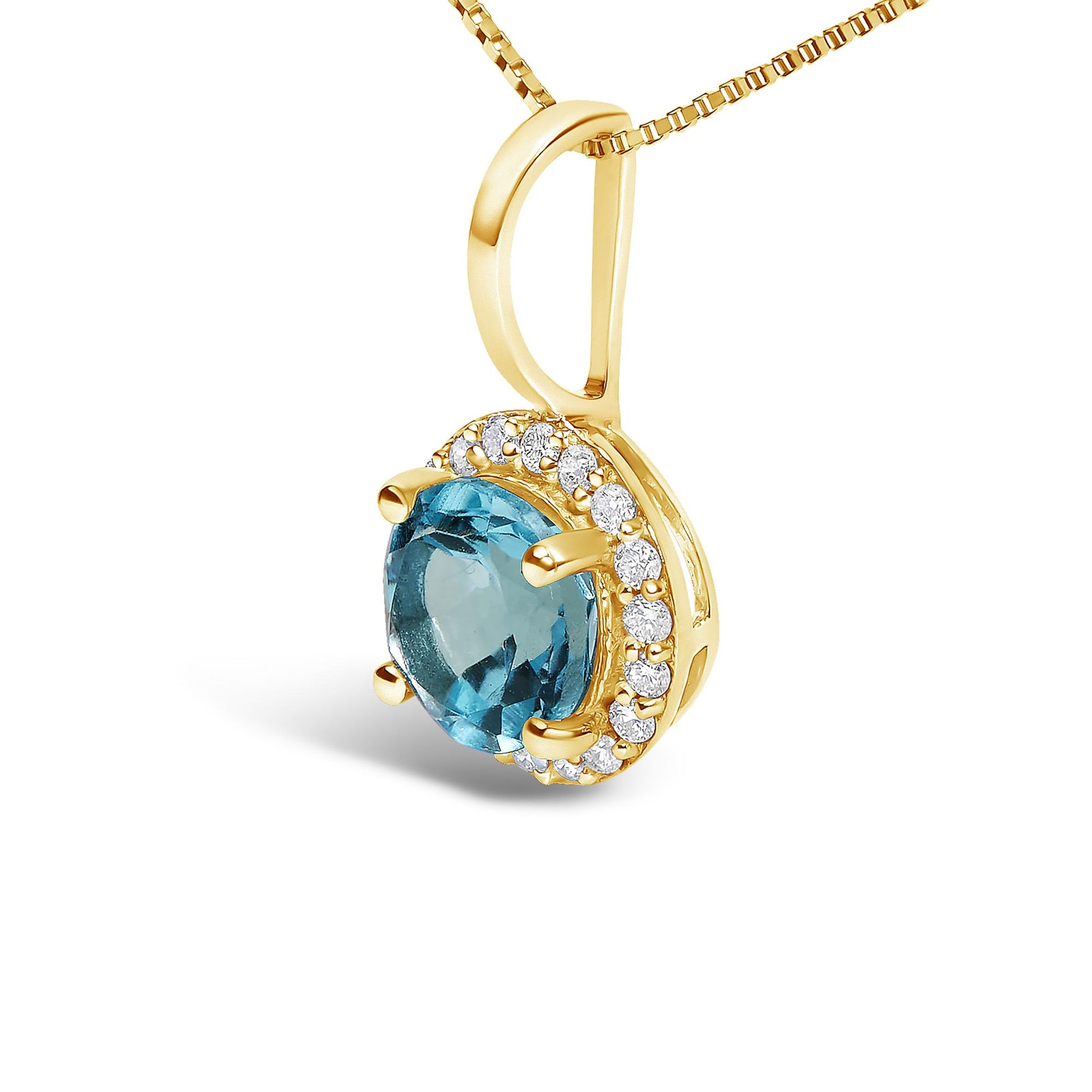 Close-up front angle of a yellow metal necklace pendant featuring a round blue gemstone with a four-prong setting, surrounded by small round white gemstones in a shared prong setting.
