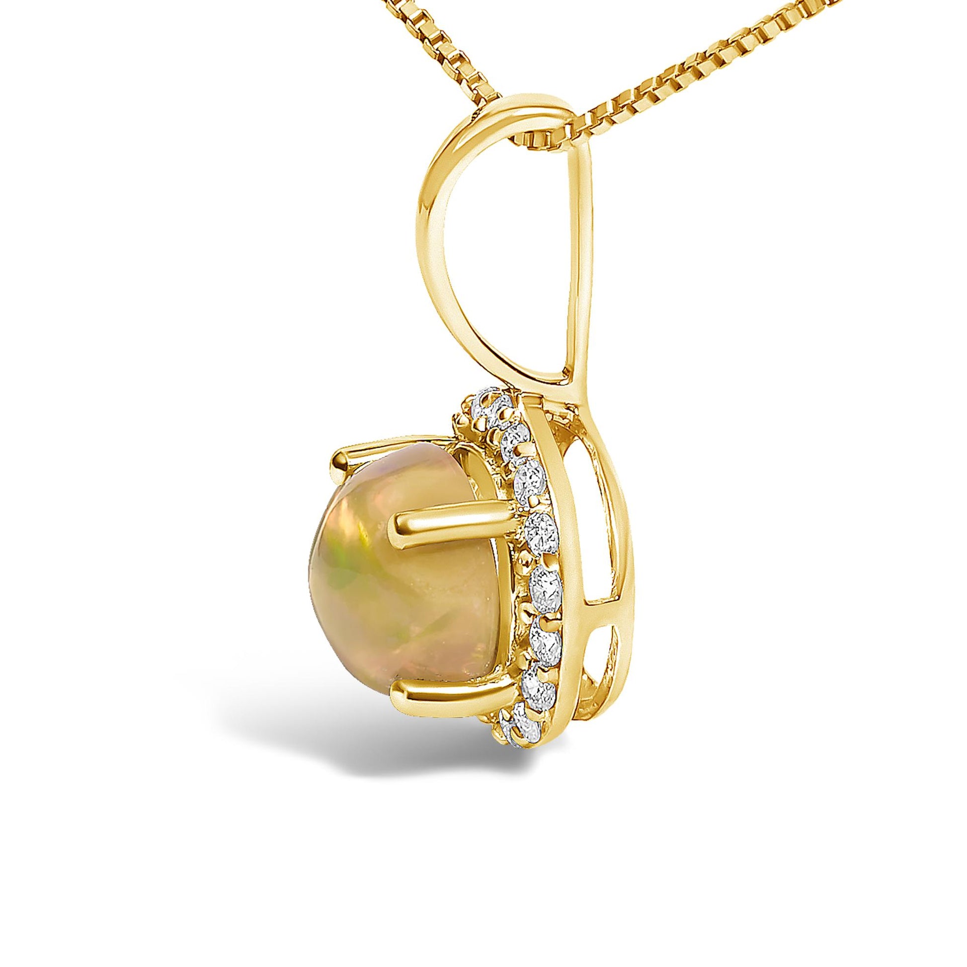 Close-up side view of a yellow metal necklace pendant featuring a round multi-color gemstone set with four prongs, surrounded by a halo of small round white gemstones in shared prong setting.