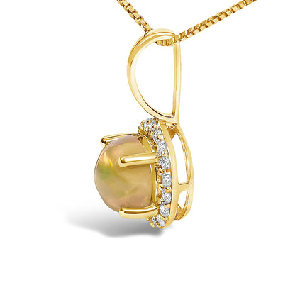 Close-up side view of a yellow metal necklace pendant featuring a round multi-color gemstone set with four prongs, surrounded by a halo of small round white gemstones in shared prong setting.