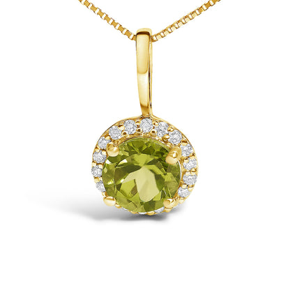 Front angle close-up of a yellow metal necklace pendant featuring a round green gemstone in a 4-prong setting surrounded by small round white gemstones in a shared prong setting.