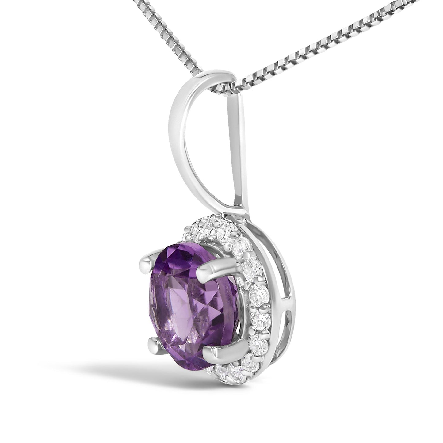 Close-up angled view of a white metal necklace pendant featuring a round purple gemstone in a four-prong setting, surrounded by round white gemstones in a shared prong setting, shown on a chain.