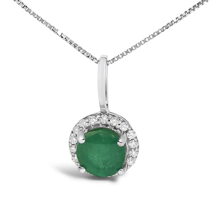 Close-up front view of a white metal necklace with a round green gemstone pendant surrounded by a halo of small round white gemstones in shared prong settings.