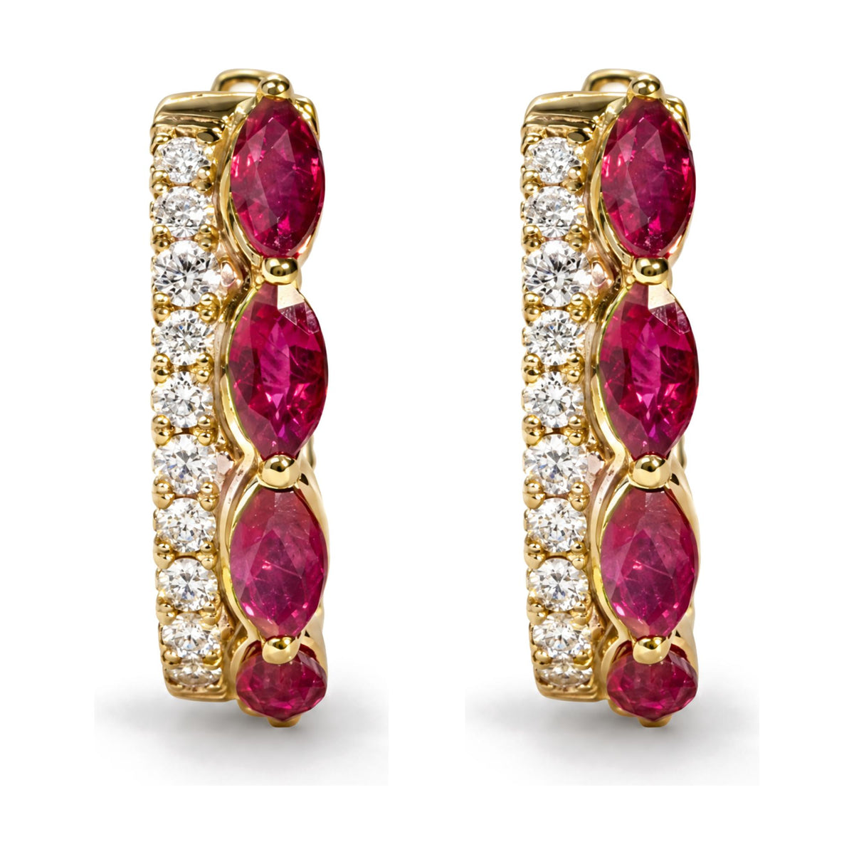Close-up front view of a pair of yellow metal hoop earrings set with marquise-shaped red gemstones and round white gemstones in prong settings.