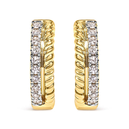 Front-facing close-up of pair of yellow earrings with twisted design and a vertical row of round white gemstones in pave setting.