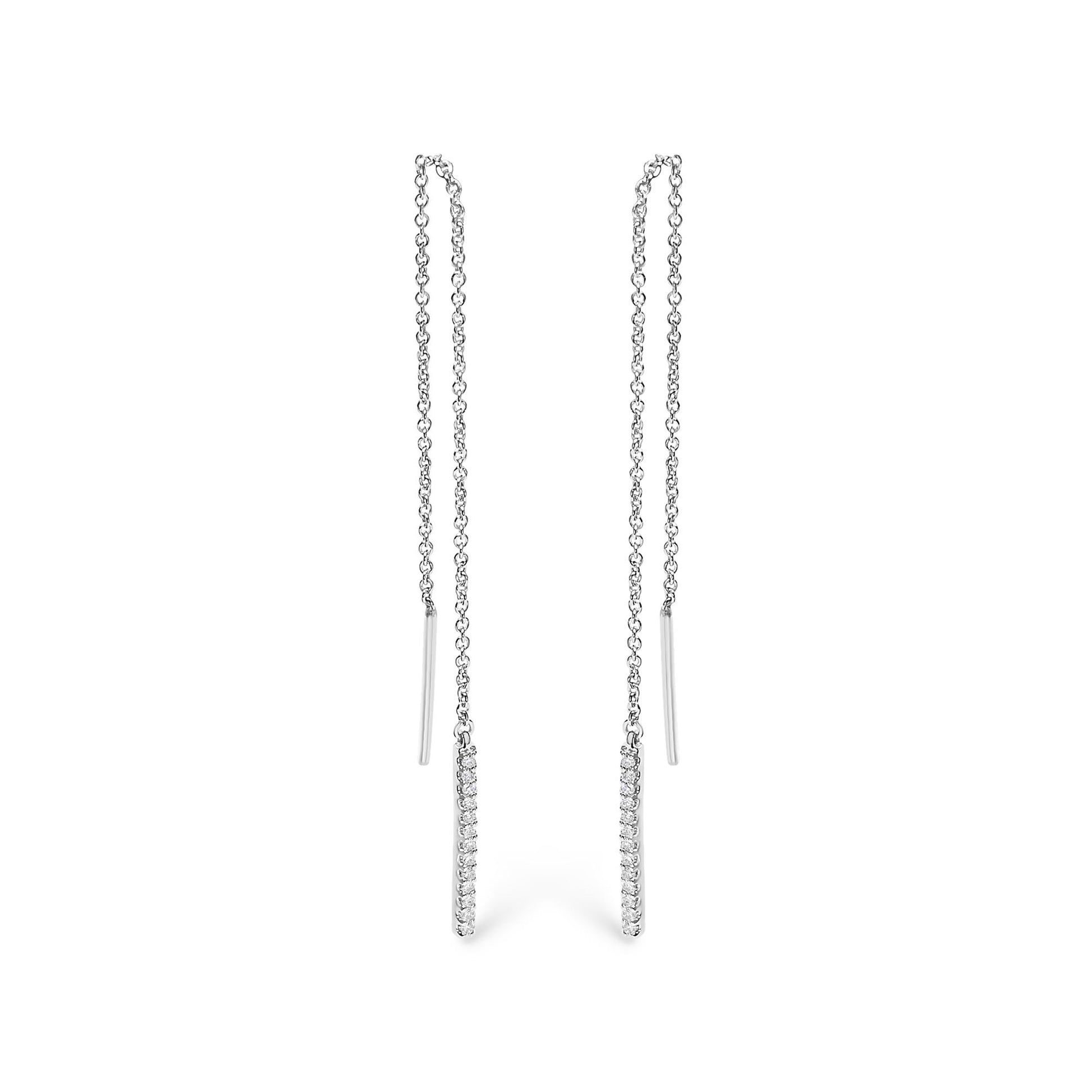 Front view of a pair of white metal threader earrings with vertical bars adorned with white gemstones in micro-pave setting, shown on a white background.