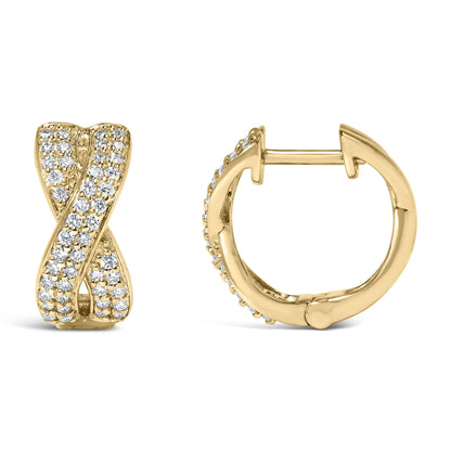 Pair of yellow metal earrings with an X-shaped design covered in round white gemstones in pave setting, shown from front and side angle on a white background.