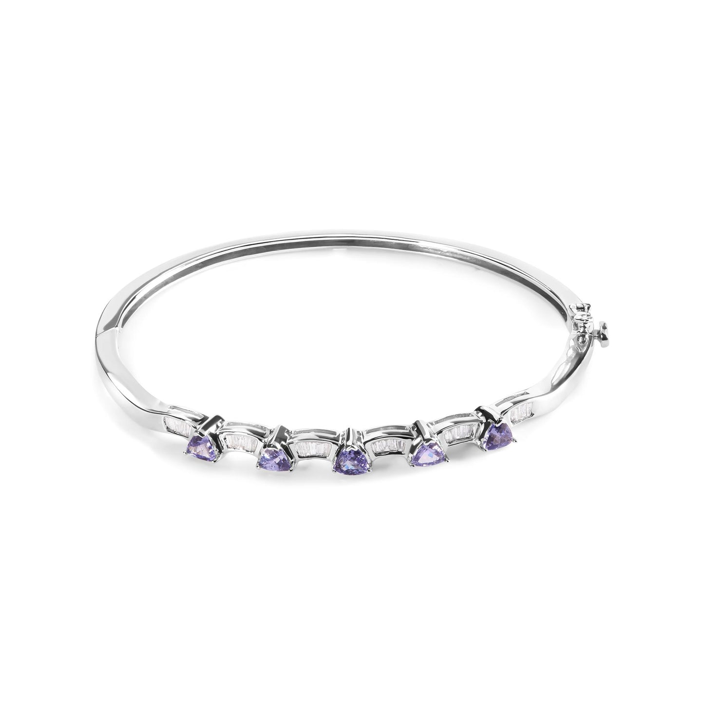 White metal bracelet shown on a white background, front angle view, featuring alternating blue trillion-shaped gemstones in prong settings and white baguette-shaped gemstones in channel settings.