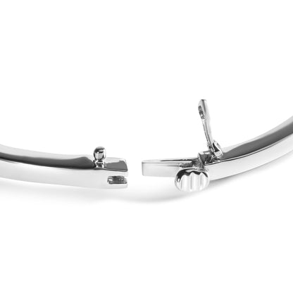 Close-up front angle of a white metal bracelet clasp, showing the locking mechanism.