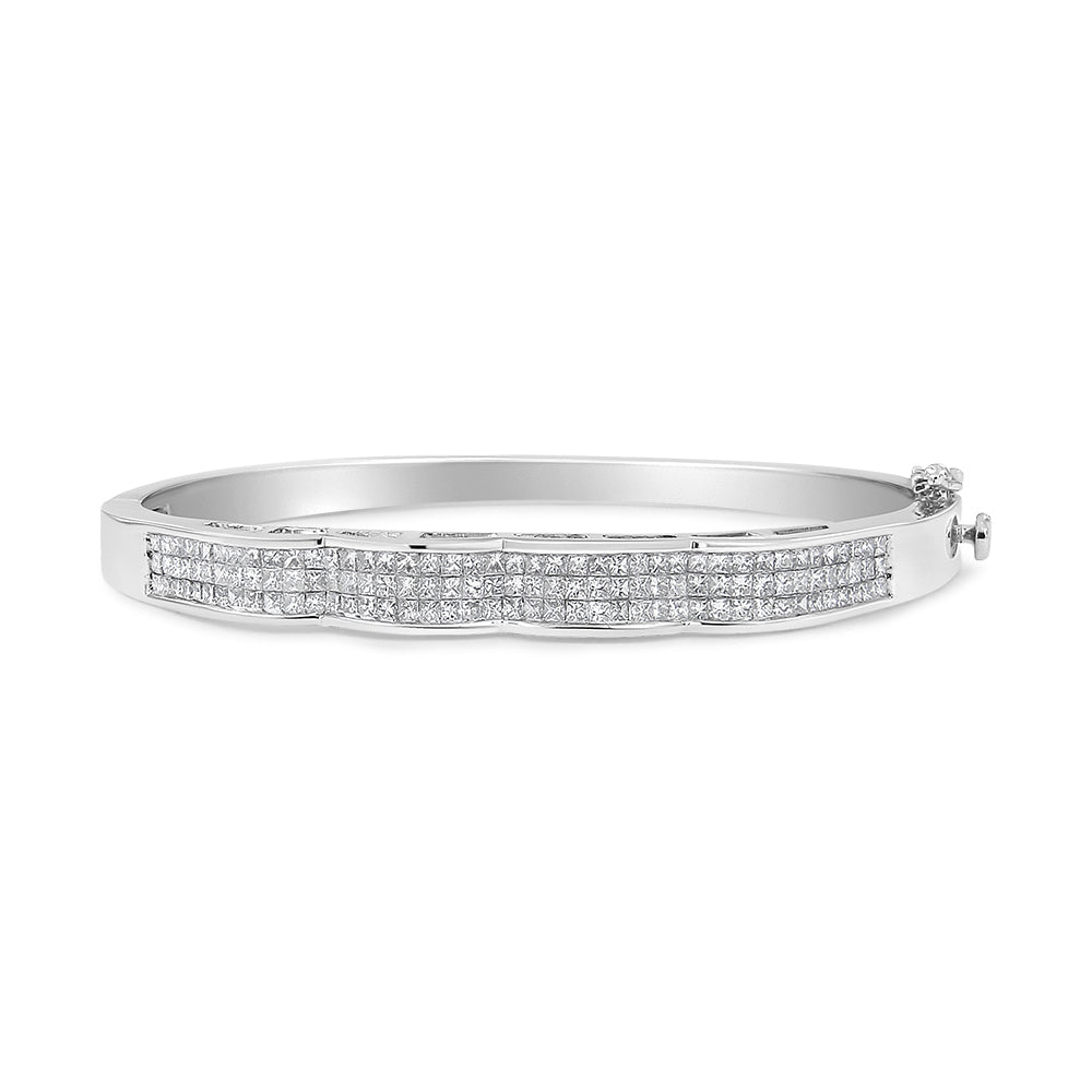 White metal bracelet with three rows of small princess-shaped white gemstones in an invisible setting, shown from a side angle.