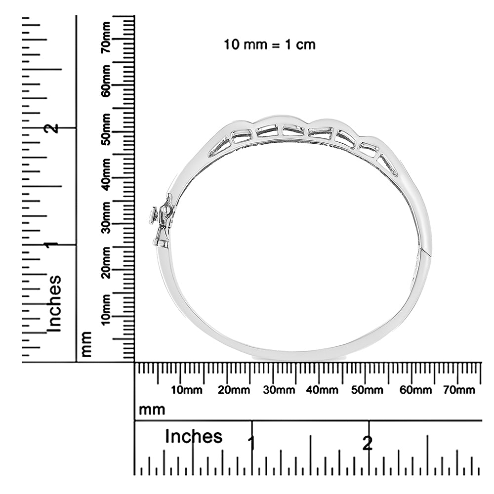 White metal bracelet with princess shape invisible set white gemstones, shown from the side on a ruler for size reference.